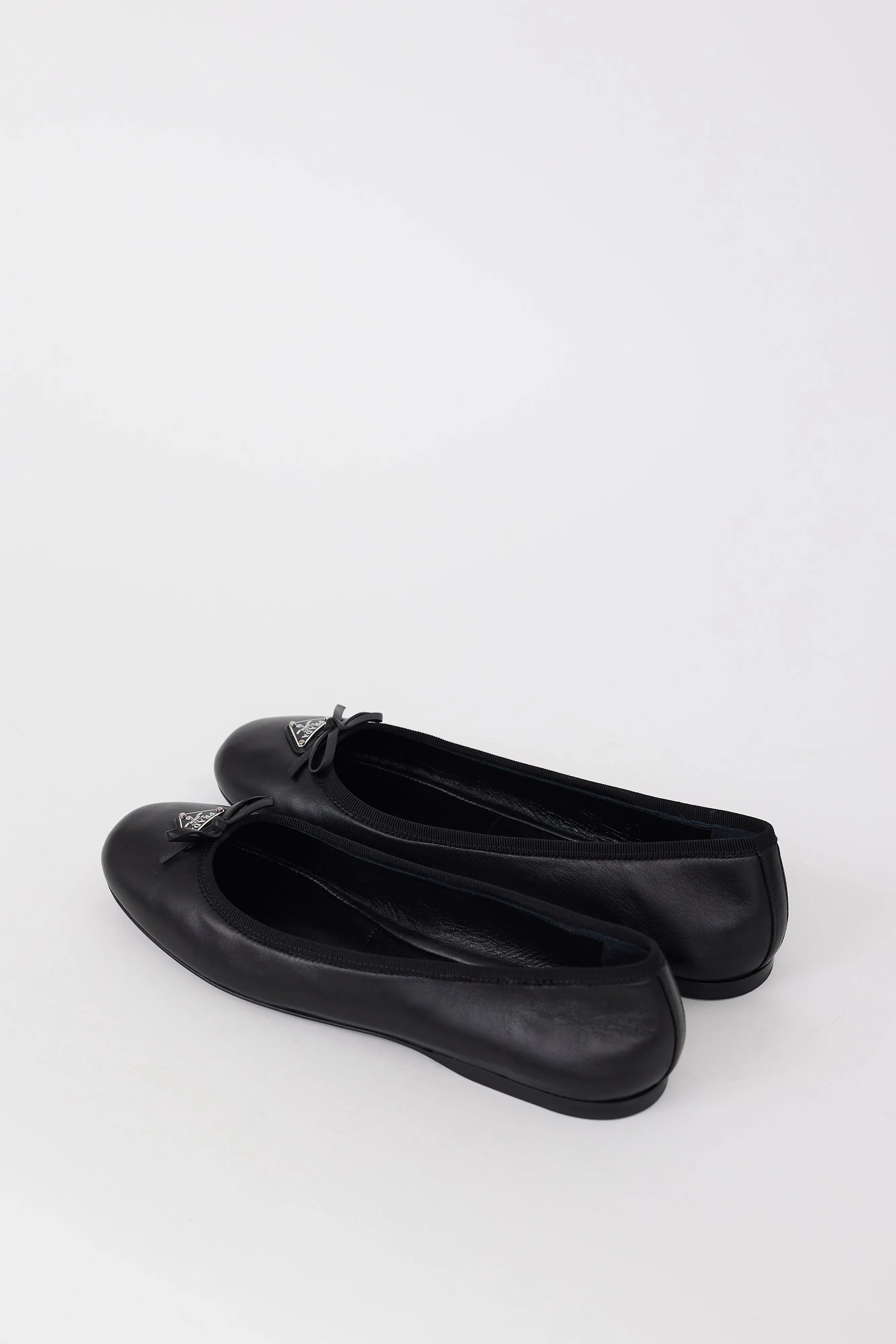 Black Leather Triangle Logo Bow Flat